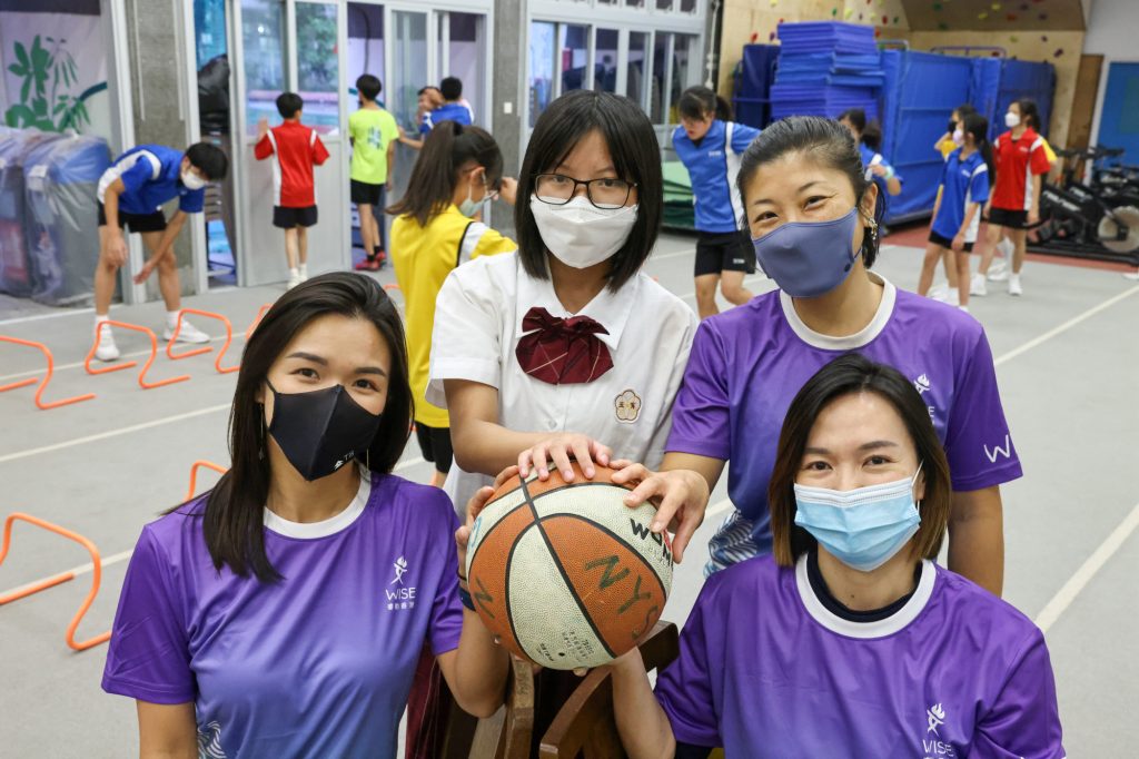 Emma Yung (centre) has found an escape from daily troubles through sport. Photo: K. Y. Cheng